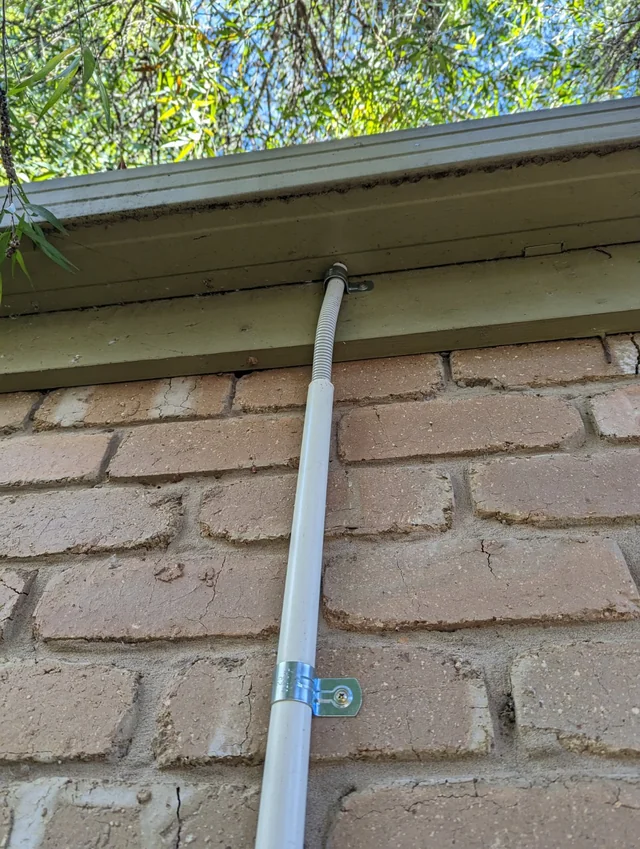 Example of covered cable outside a home